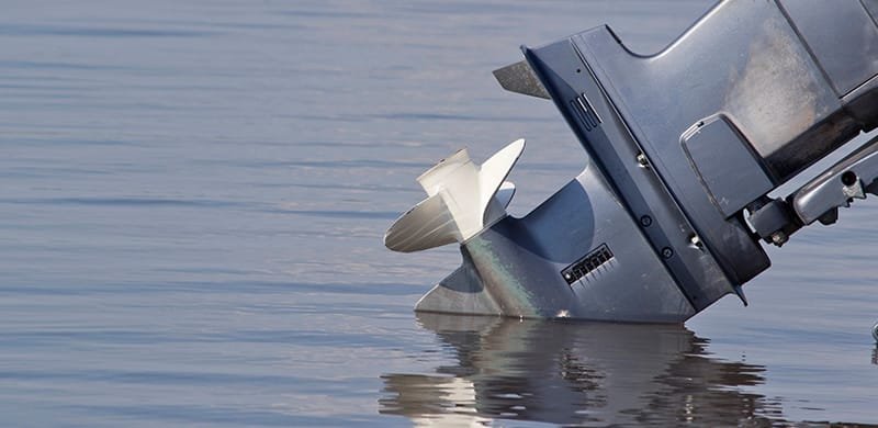 Outboard Motor With Stainless Steel Propeller Attached